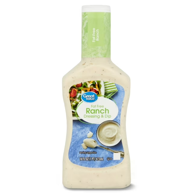 A bottle of creamy ranch dressing with a smooth texture, ready to be poured onto salads, vegetables, or snacks